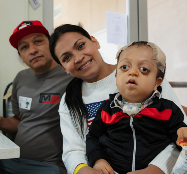 mom and dad with child