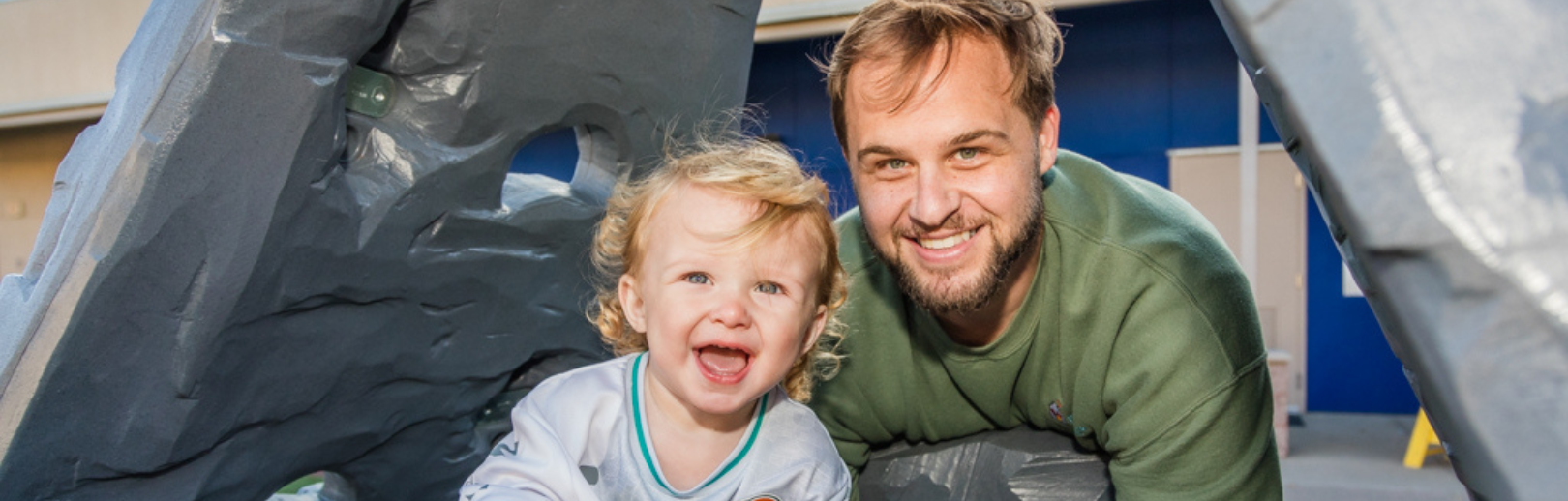 father and child smiling